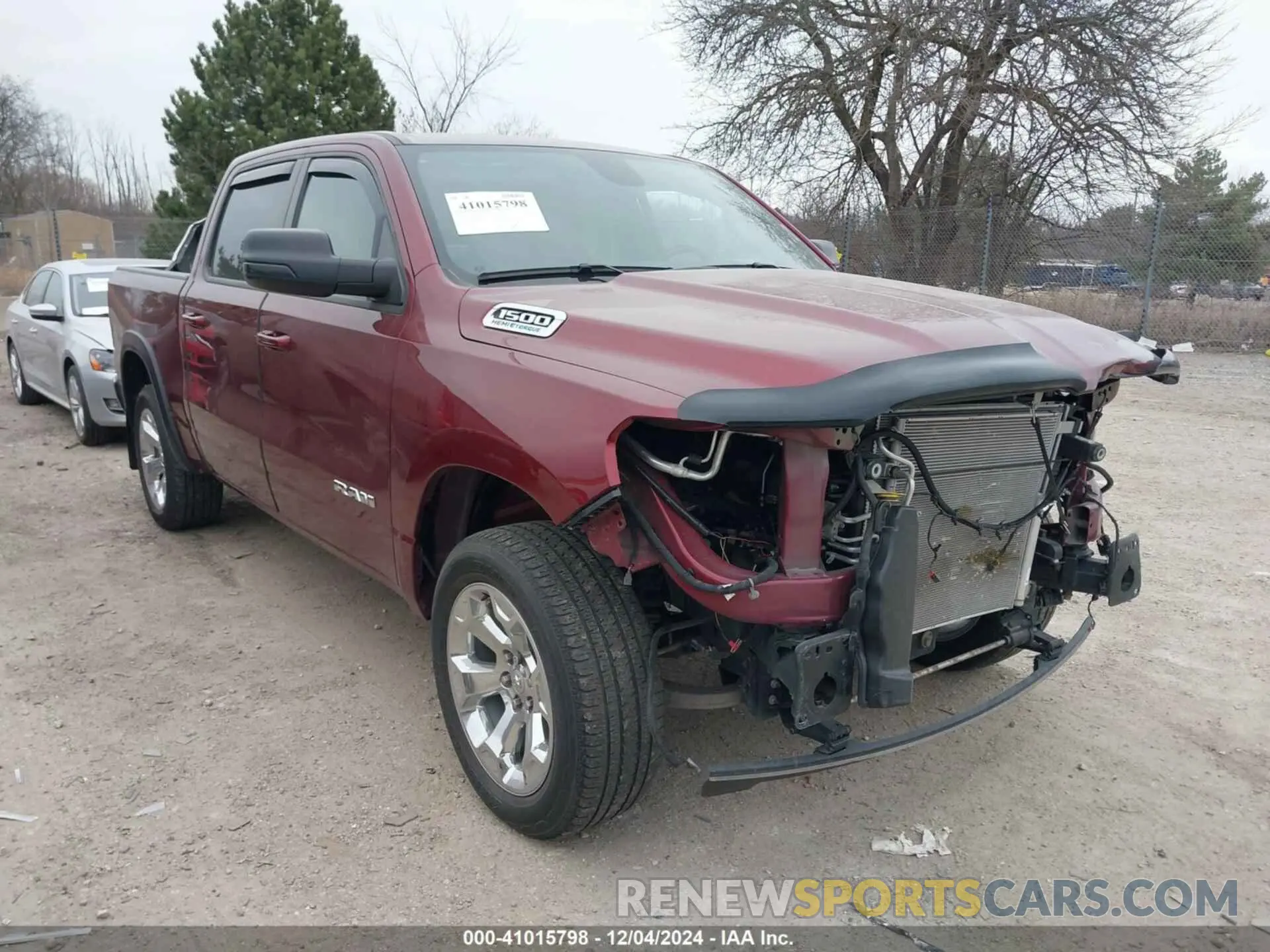 1 Photograph of a damaged car 1C6SRFFT9MN798520 RAM 1500 2021