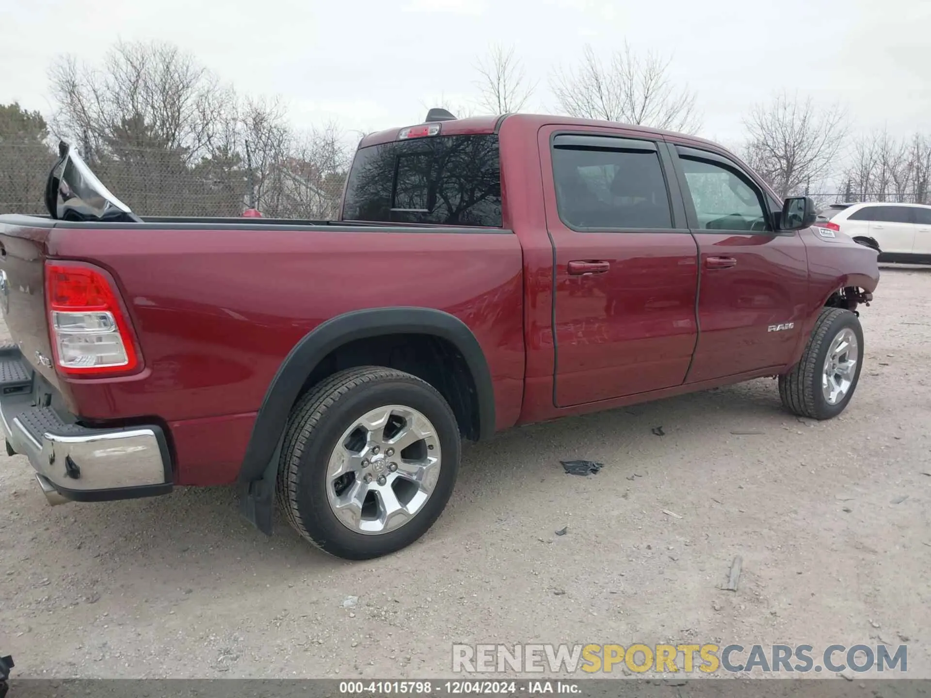 4 Photograph of a damaged car 1C6SRFFT9MN798520 RAM 1500 2021