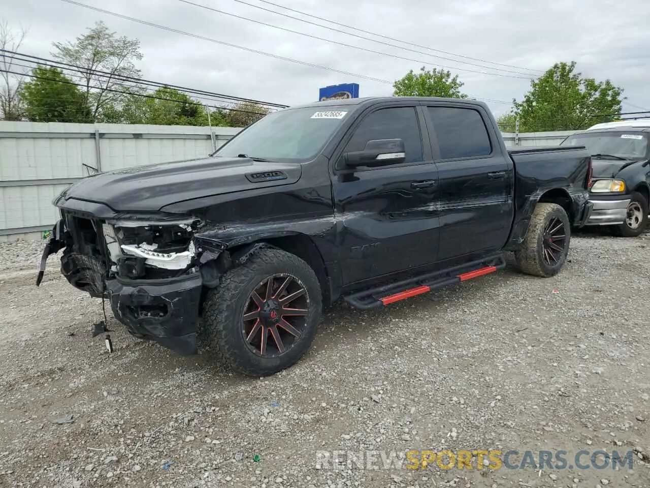 1 Photograph of a damaged car 1C6SRFFTXMN512576 RAM 1500 2021