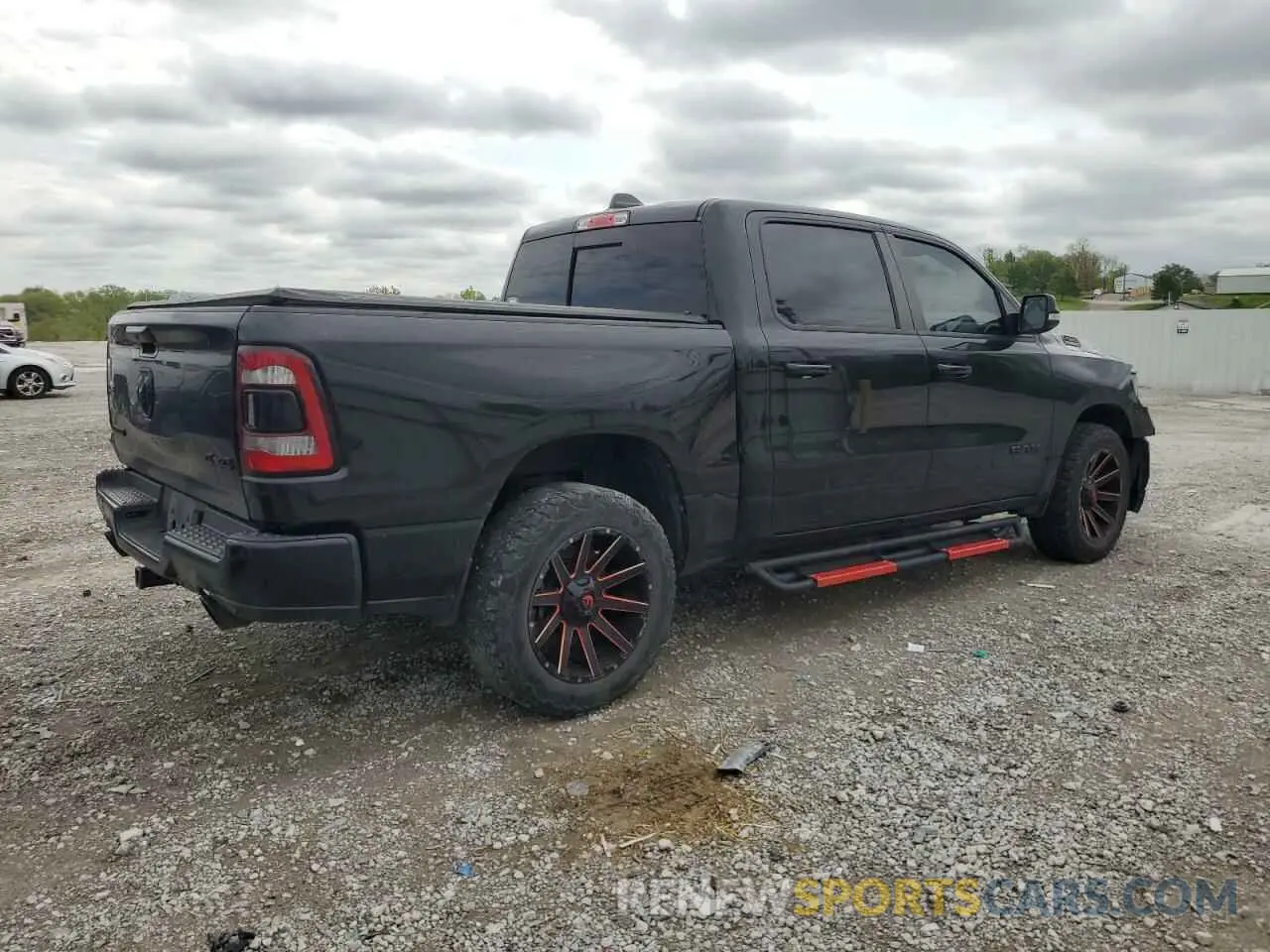 3 Photograph of a damaged car 1C6SRFFTXMN512576 RAM 1500 2021