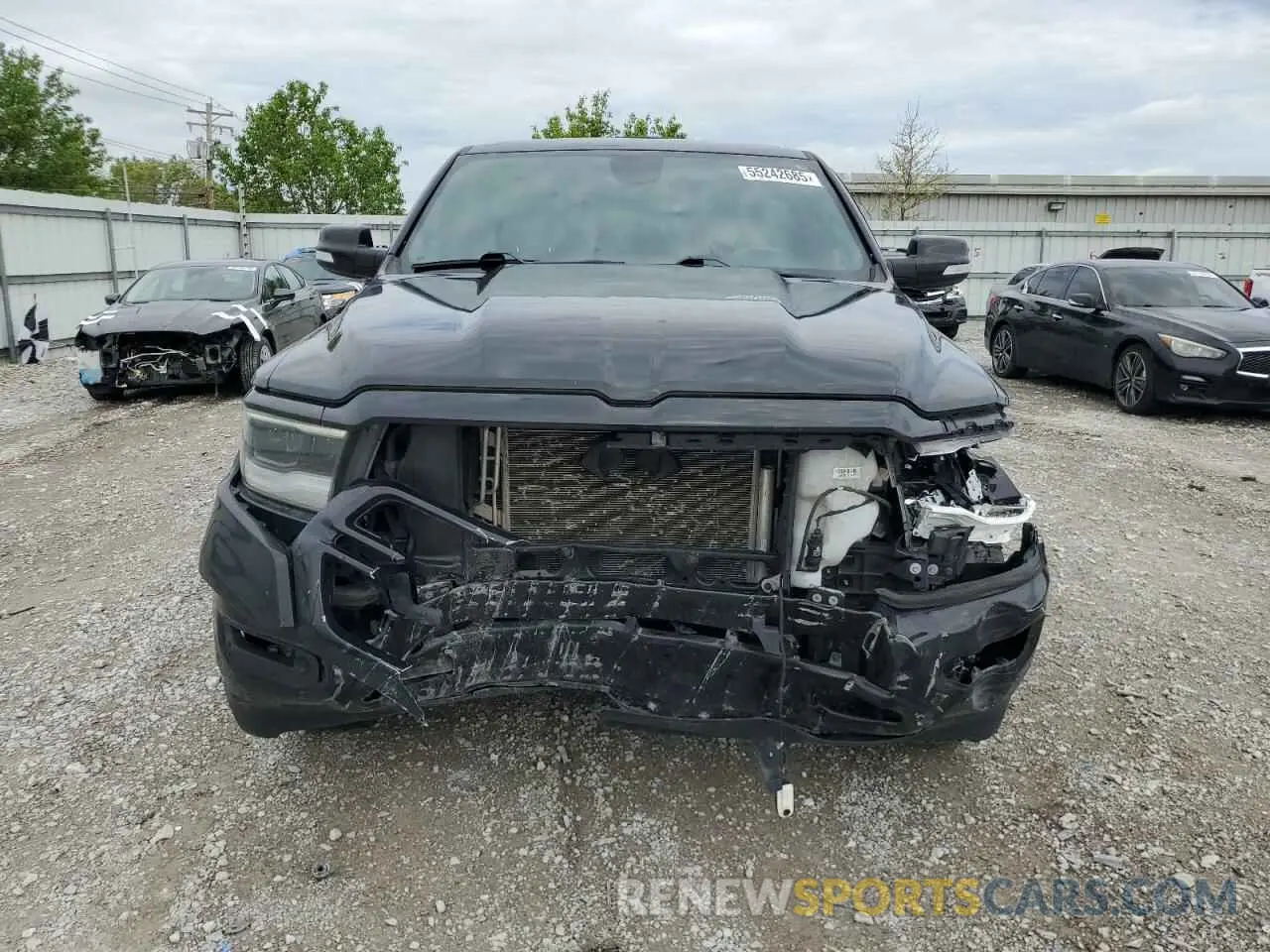 5 Photograph of a damaged car 1C6SRFFTXMN512576 RAM 1500 2021
