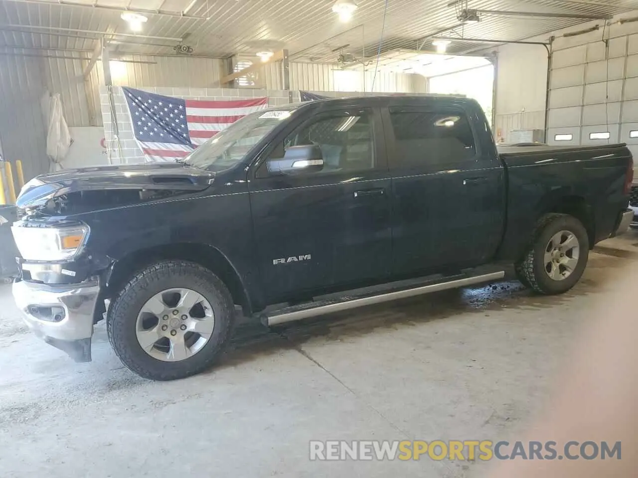 1 Photograph of a damaged car 1C6SRFFTXMN515767 RAM 1500 2021