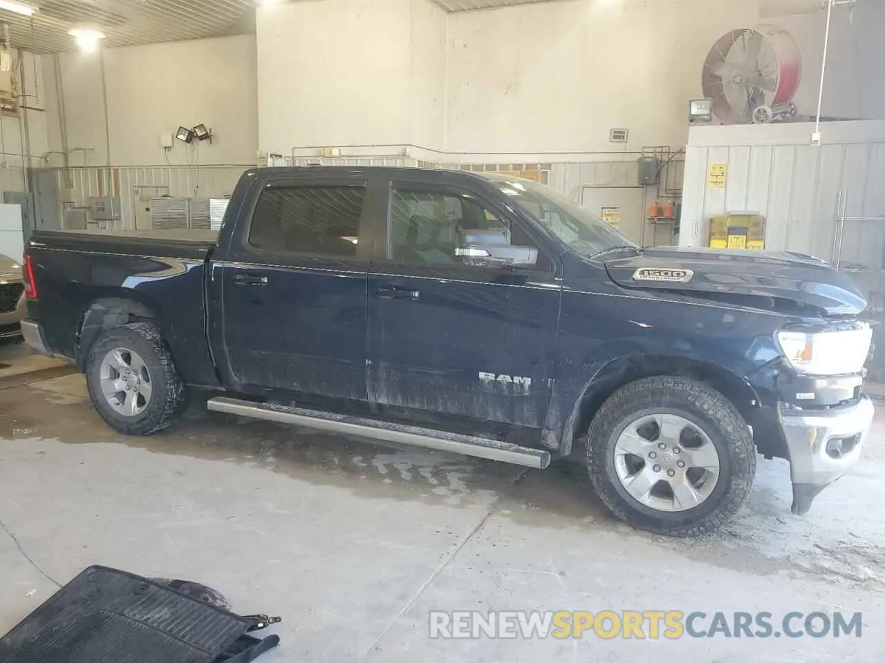 4 Photograph of a damaged car 1C6SRFFTXMN515767 RAM 1500 2021