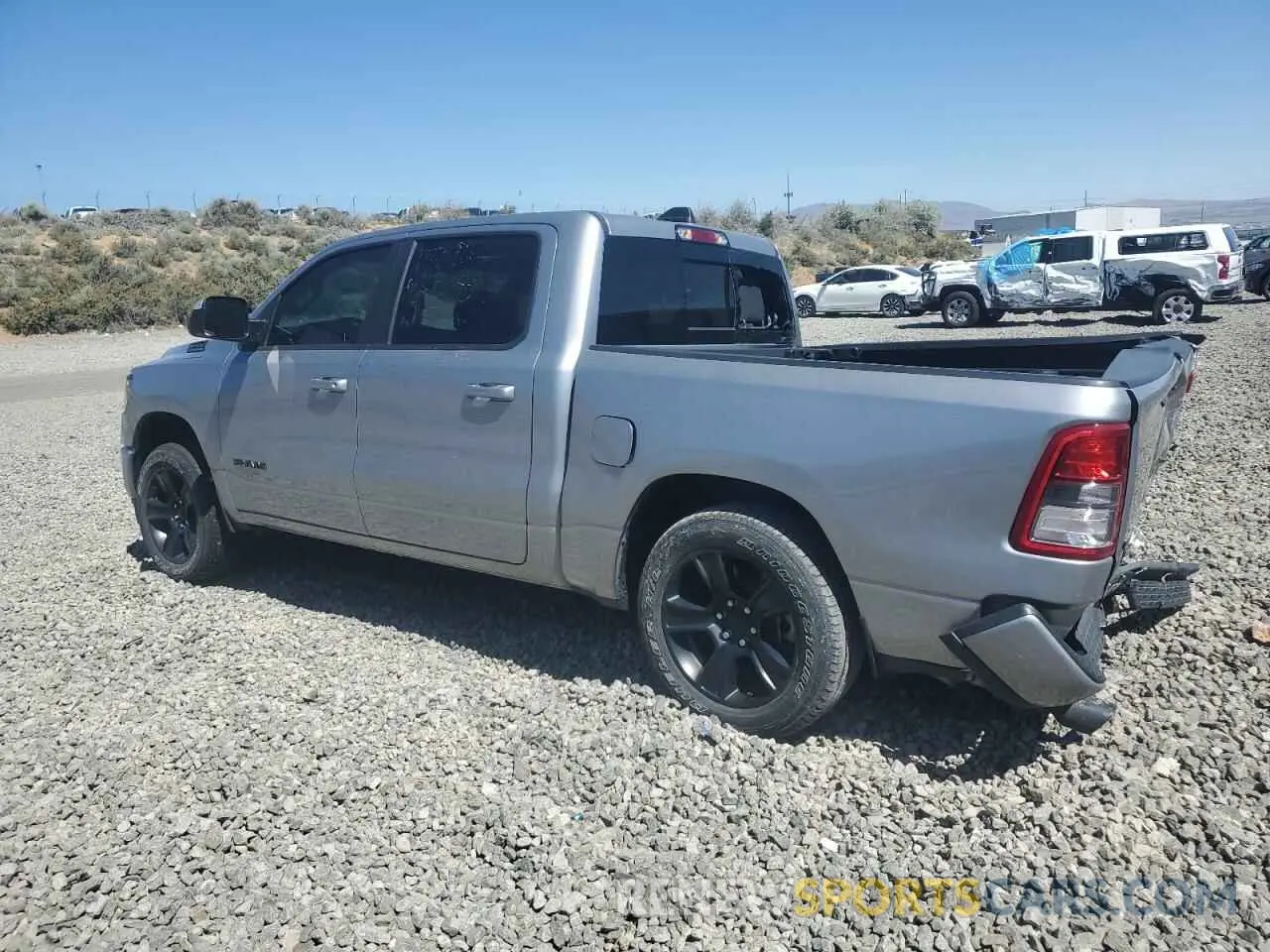 2 Photograph of a damaged car 1C6SRFFTXMN537235 RAM 1500 2021