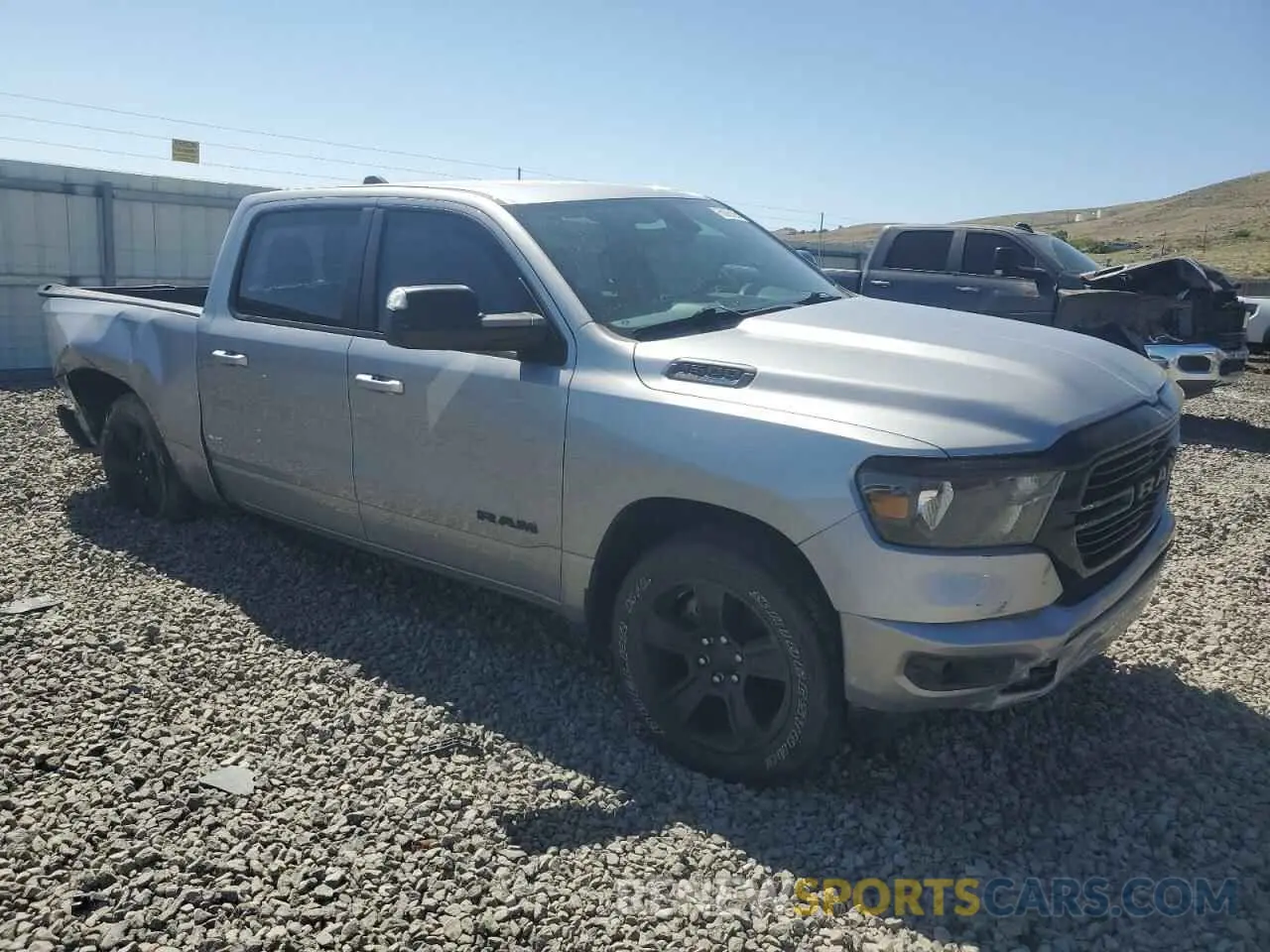 4 Photograph of a damaged car 1C6SRFFTXMN537235 RAM 1500 2021