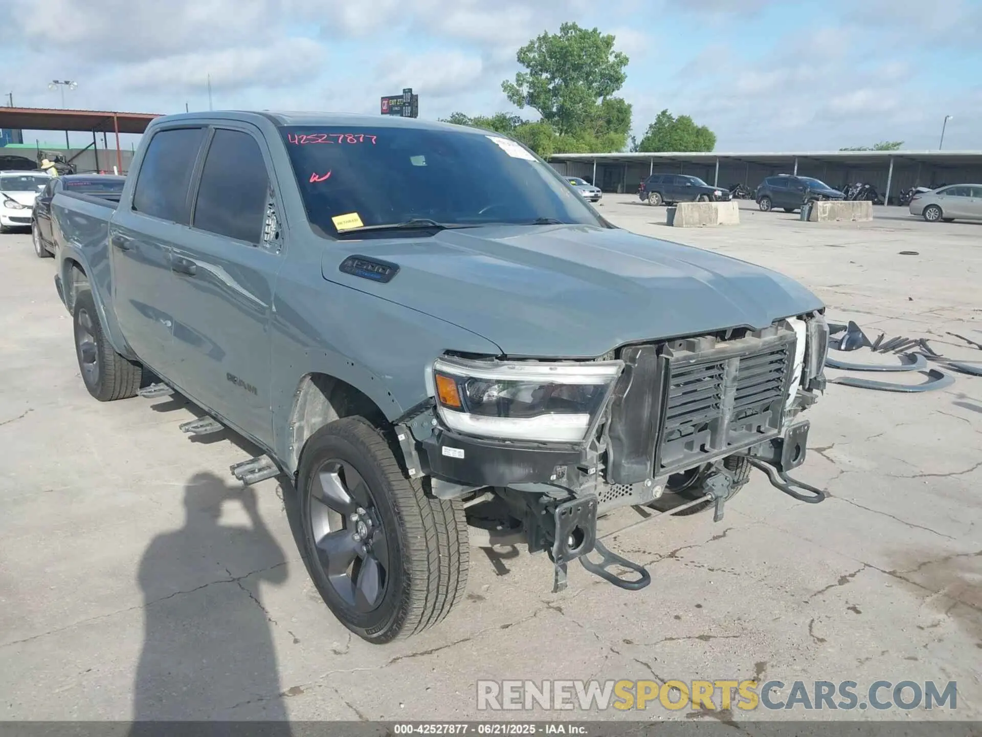 1 Photograph of a damaged car 1C6SRFFTXMN558862 RAM 1500 2021