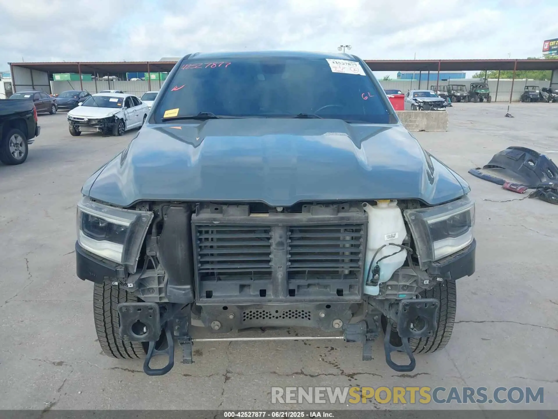 13 Photograph of a damaged car 1C6SRFFTXMN558862 RAM 1500 2021