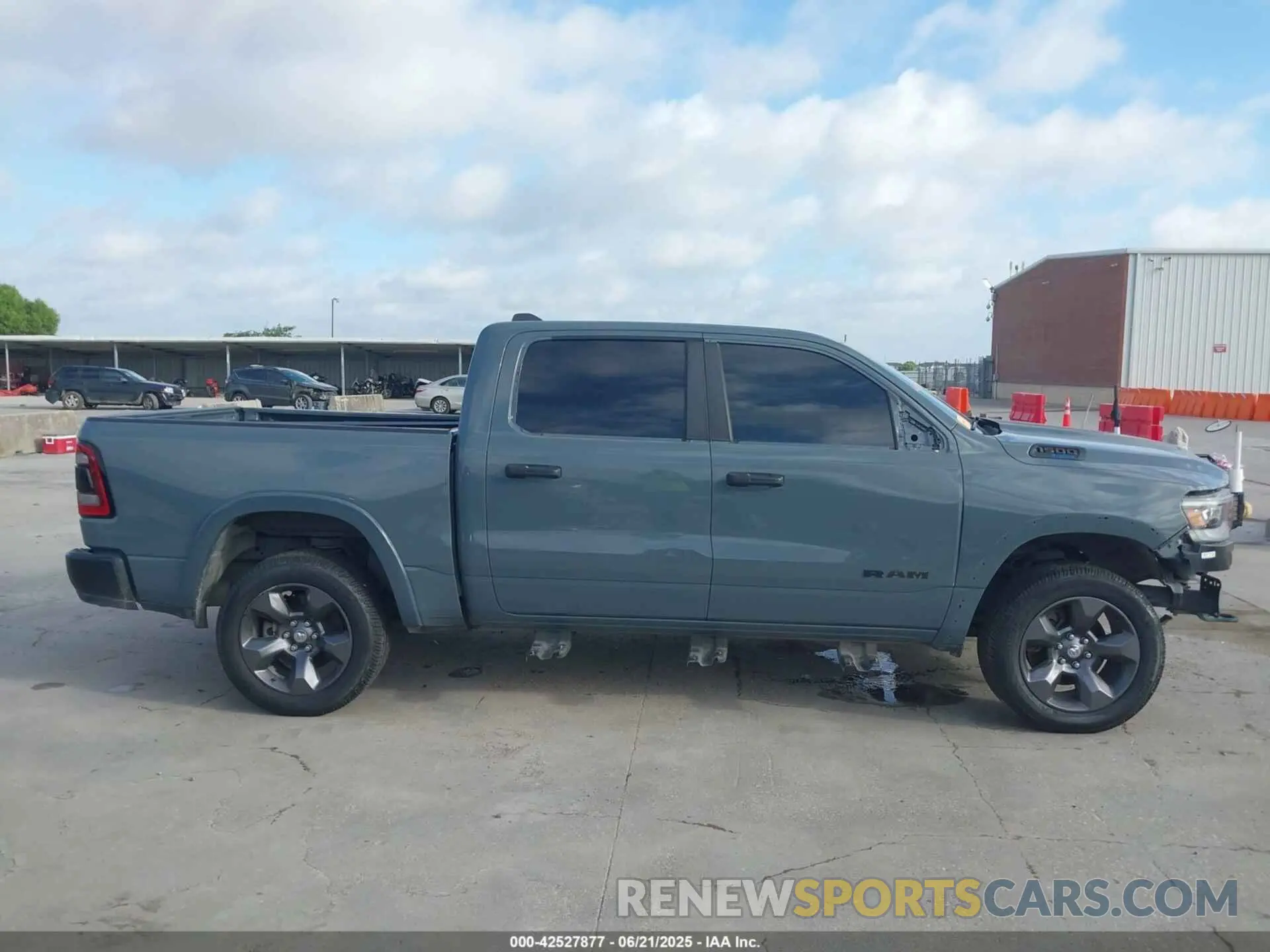 14 Photograph of a damaged car 1C6SRFFTXMN558862 RAM 1500 2021