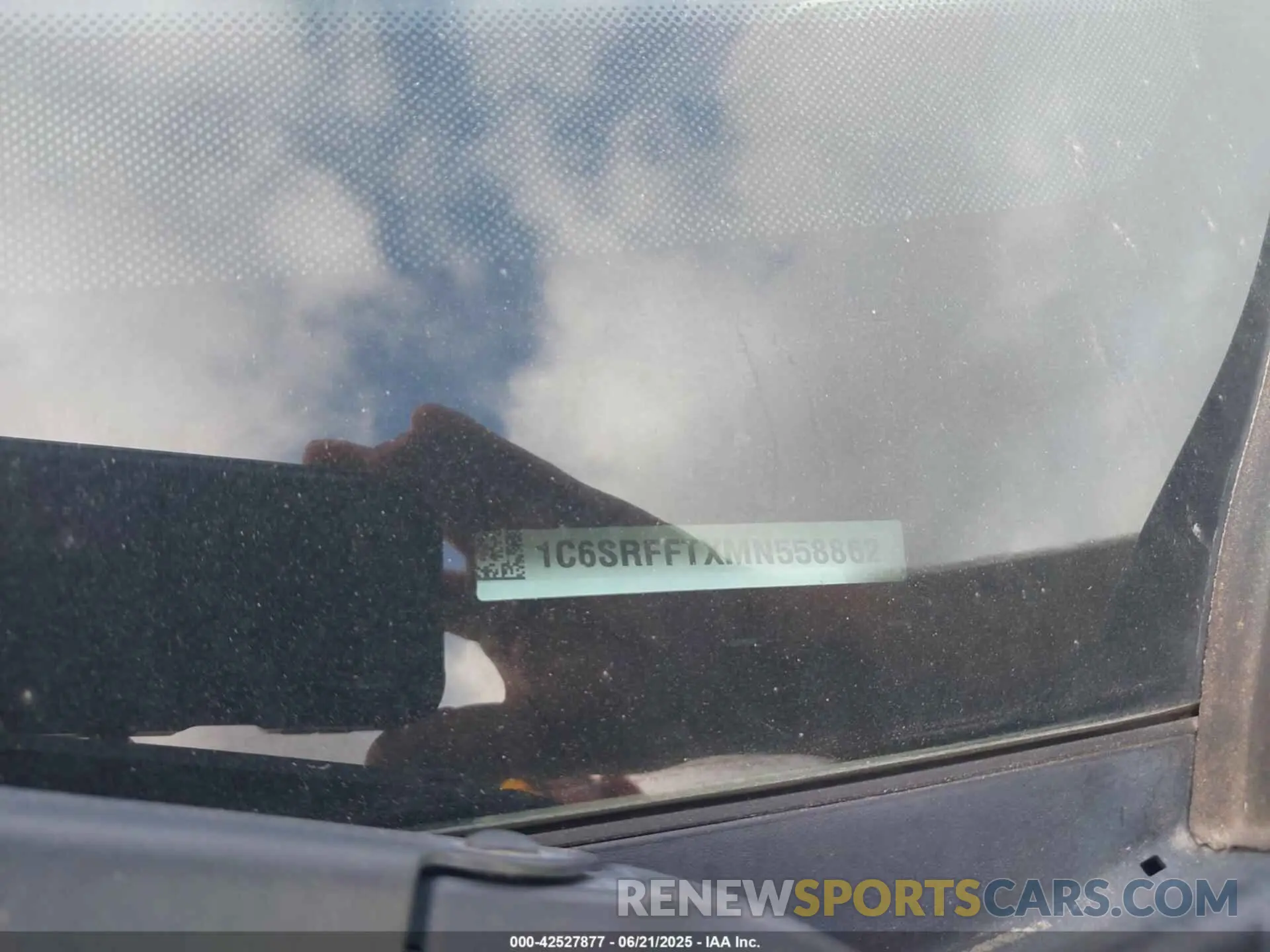 18 Photograph of a damaged car 1C6SRFFTXMN558862 RAM 1500 2021