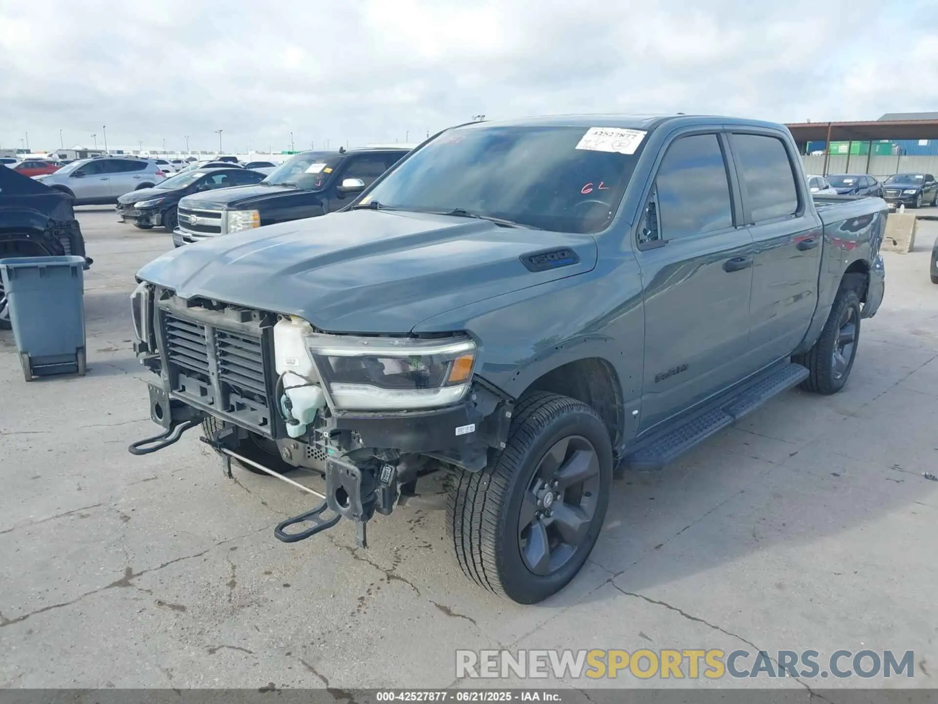2 Photograph of a damaged car 1C6SRFFTXMN558862 RAM 1500 2021