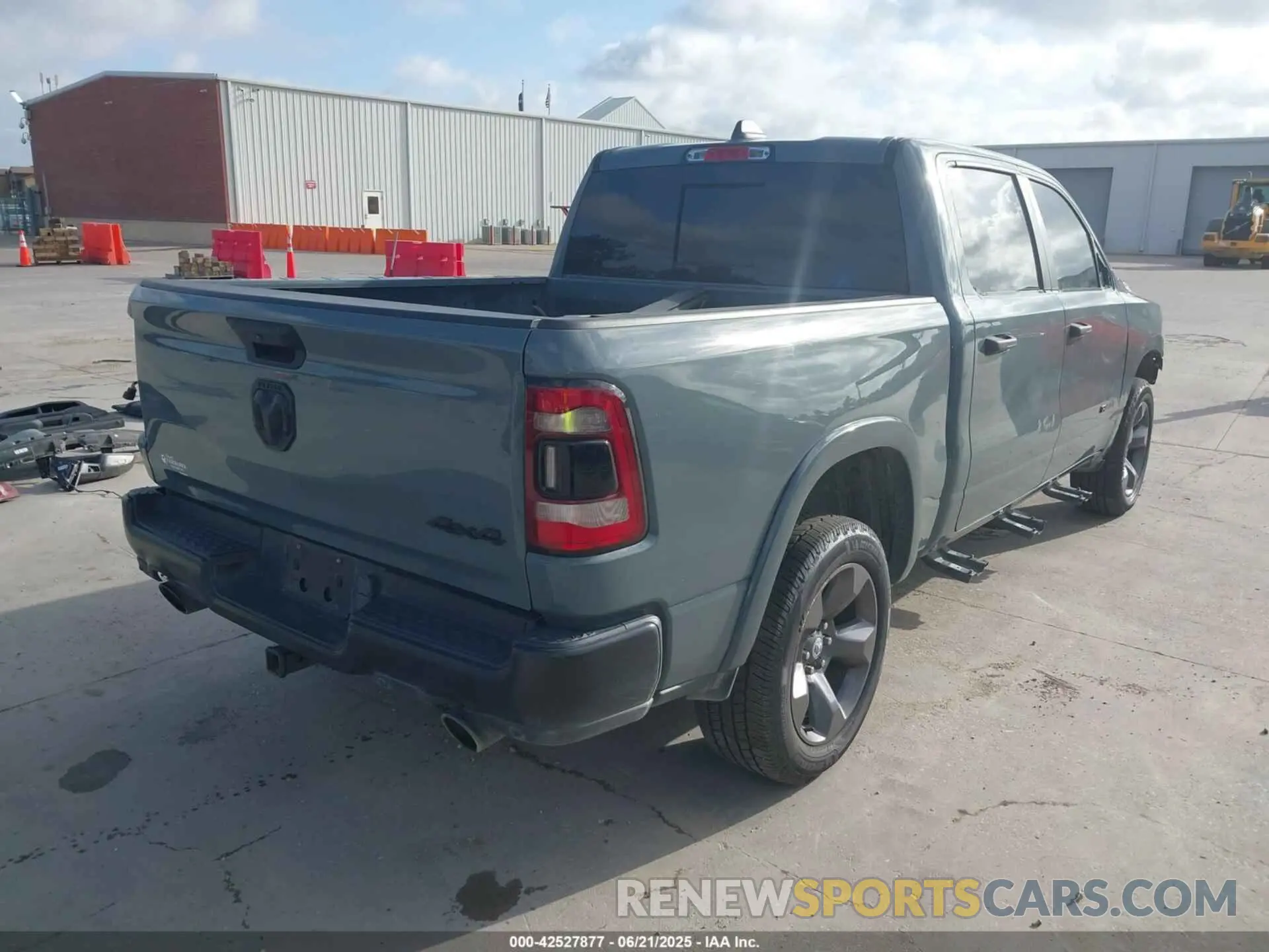 4 Photograph of a damaged car 1C6SRFFTXMN558862 RAM 1500 2021