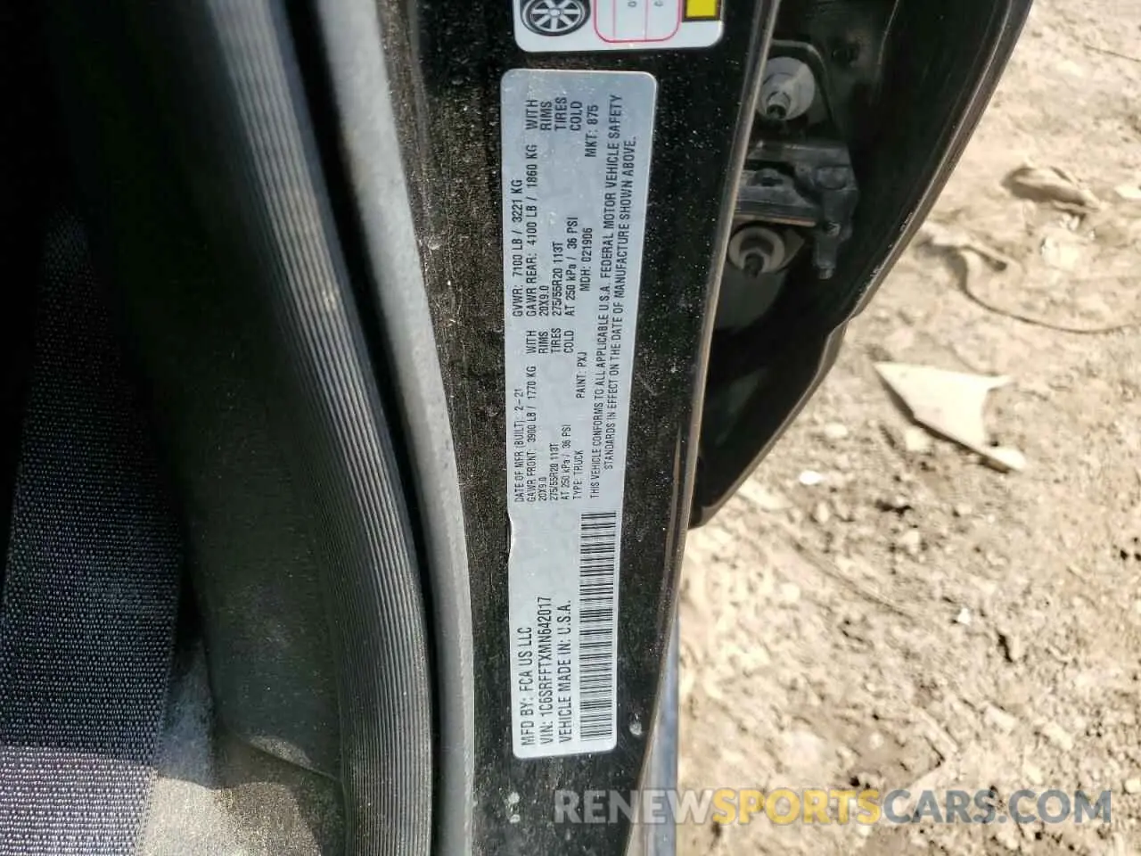 12 Photograph of a damaged car 1C6SRFFTXMN642017 RAM 1500 2021