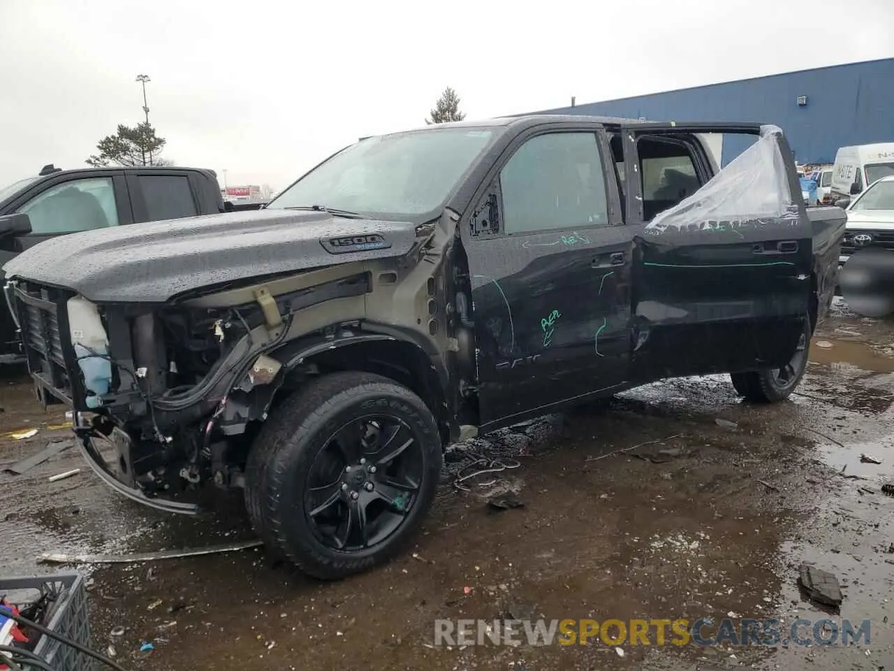 1 Photograph of a damaged car 1C6SRFFTXMN650909 RAM 1500 2021