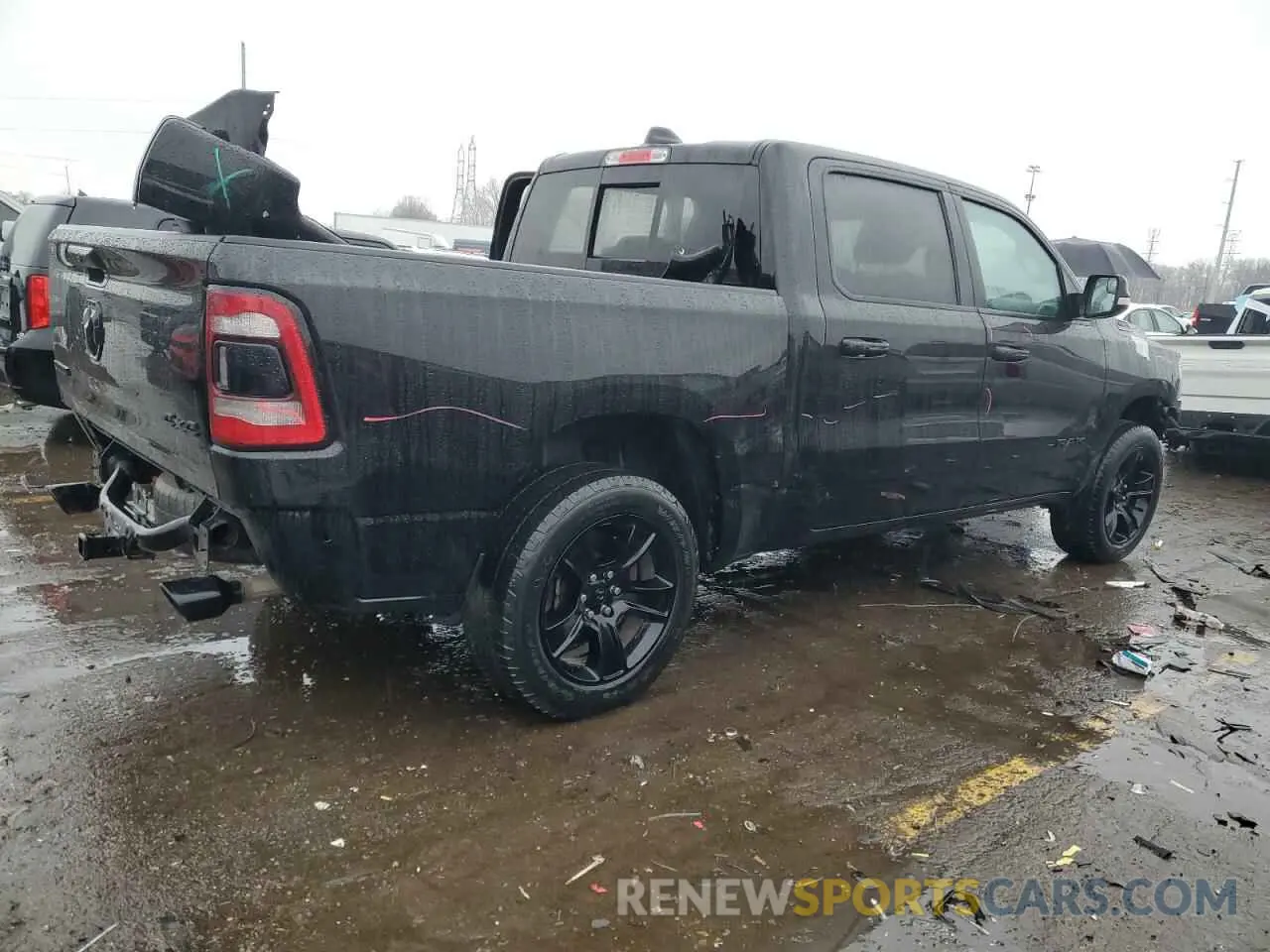 3 Photograph of a damaged car 1C6SRFFTXMN650909 RAM 1500 2021