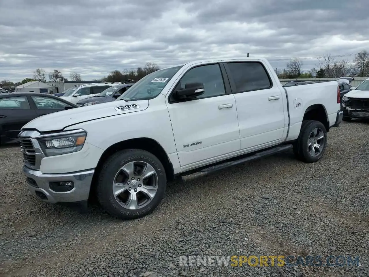 1 Photograph of a damaged car 1C6SRFFTXMN724006 RAM 1500 2021