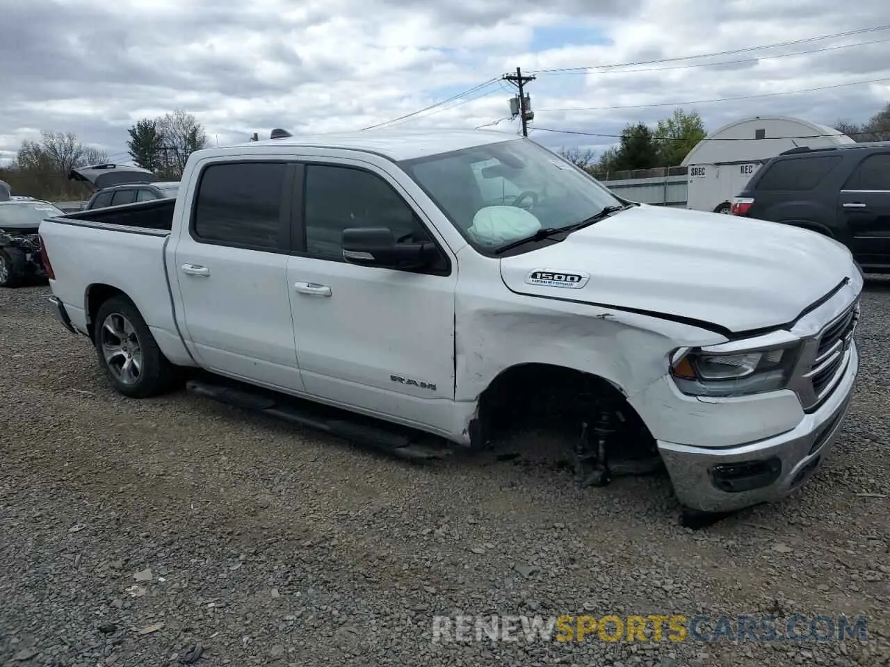 4 Photograph of a damaged car 1C6SRFFTXMN724006 RAM 1500 2021