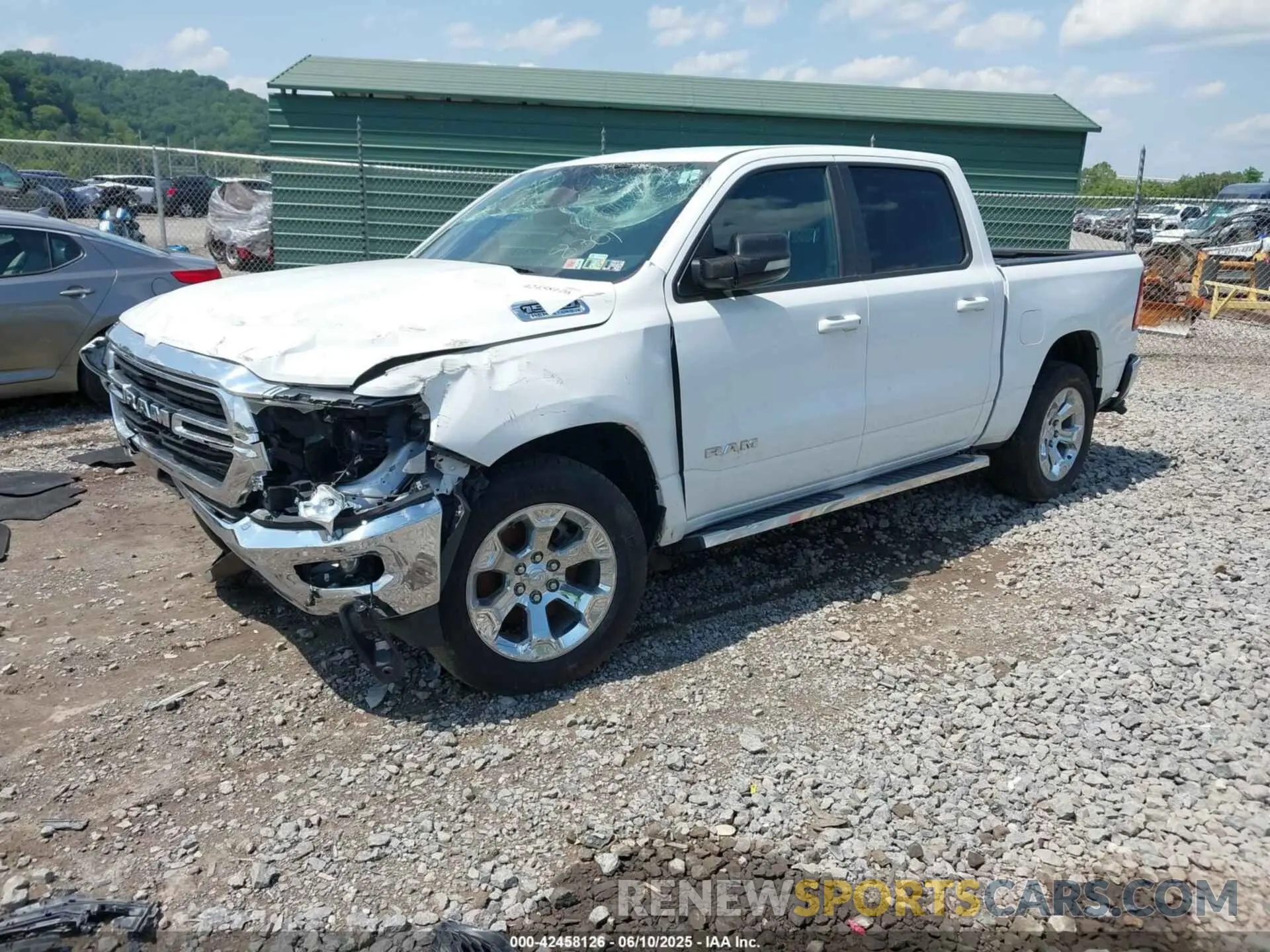 2 Photograph of a damaged car 1C6SRFFTXMN728301 RAM 1500 2021