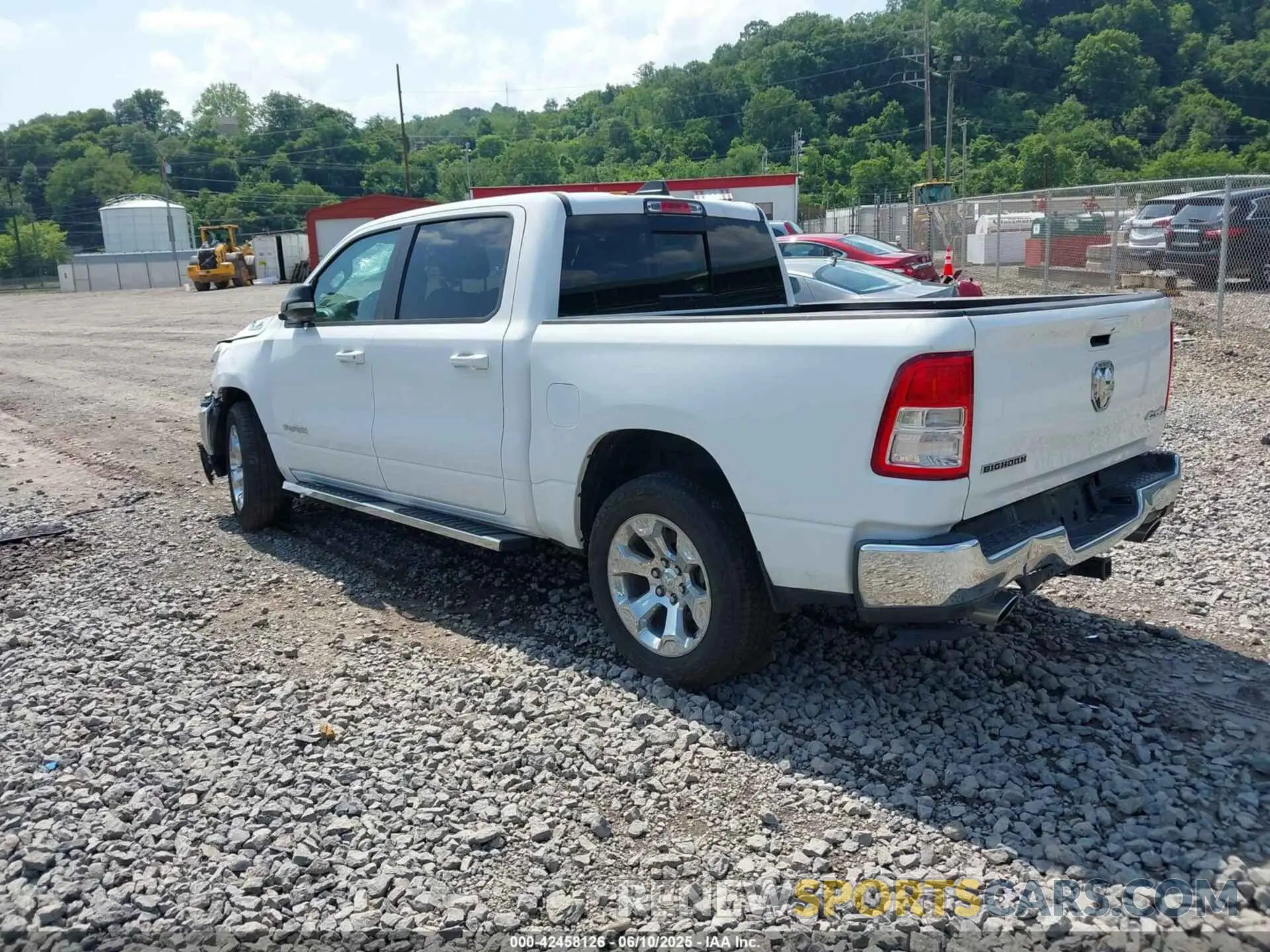 3 Photograph of a damaged car 1C6SRFFTXMN728301 RAM 1500 2021