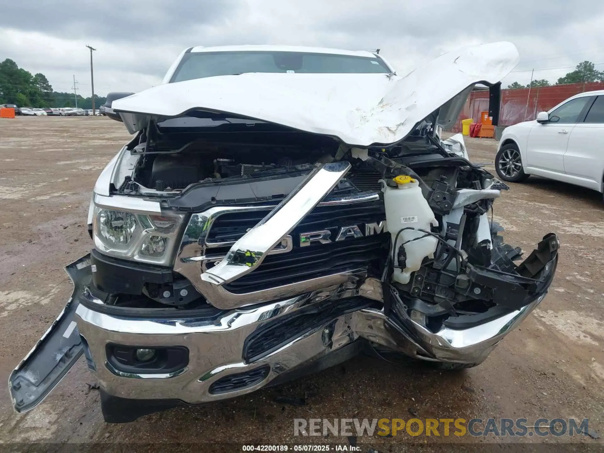 13 Photograph of a damaged car 1C6SRFFTXMN744336 RAM 1500 2021