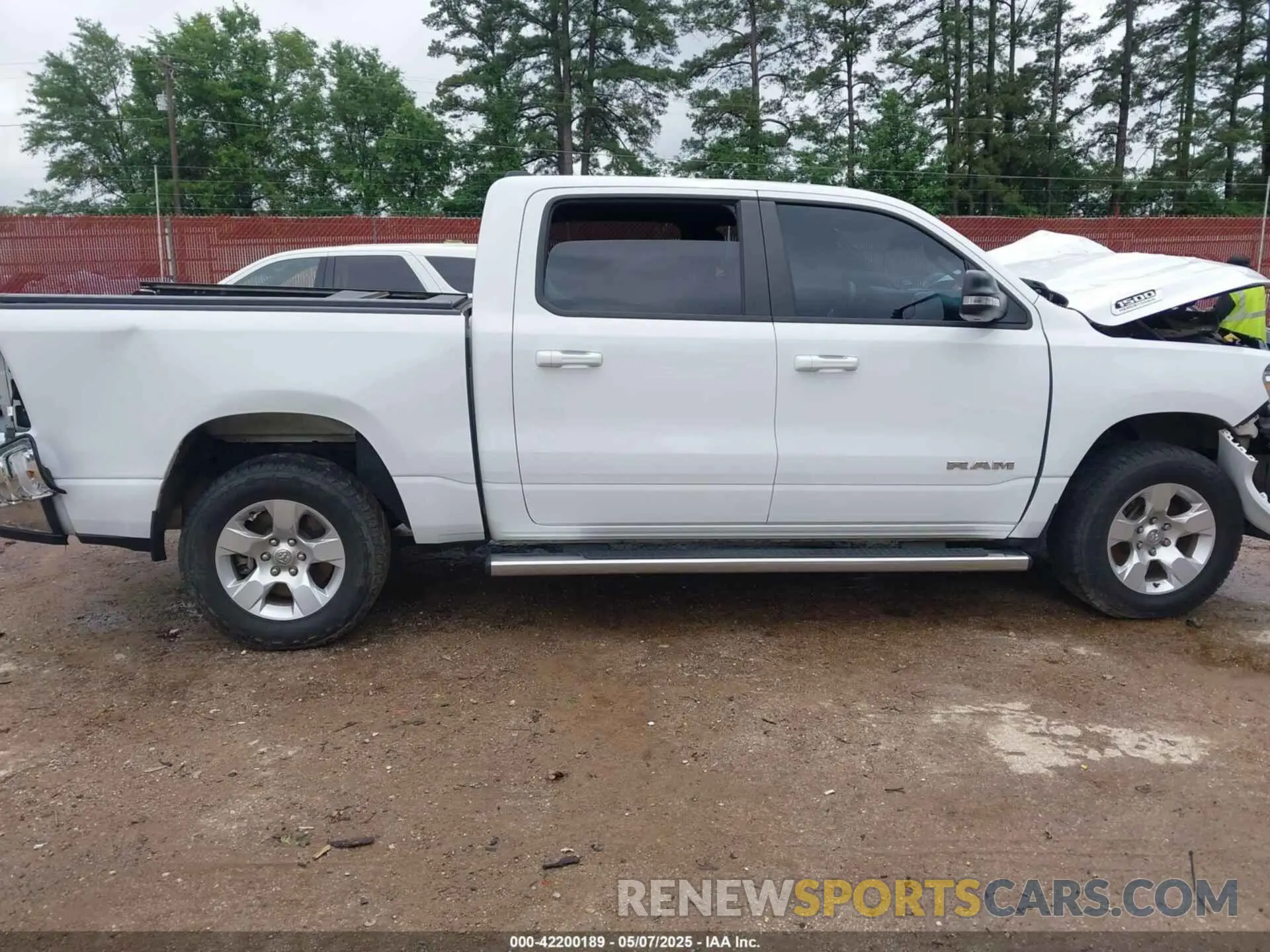 14 Photograph of a damaged car 1C6SRFFTXMN744336 RAM 1500 2021