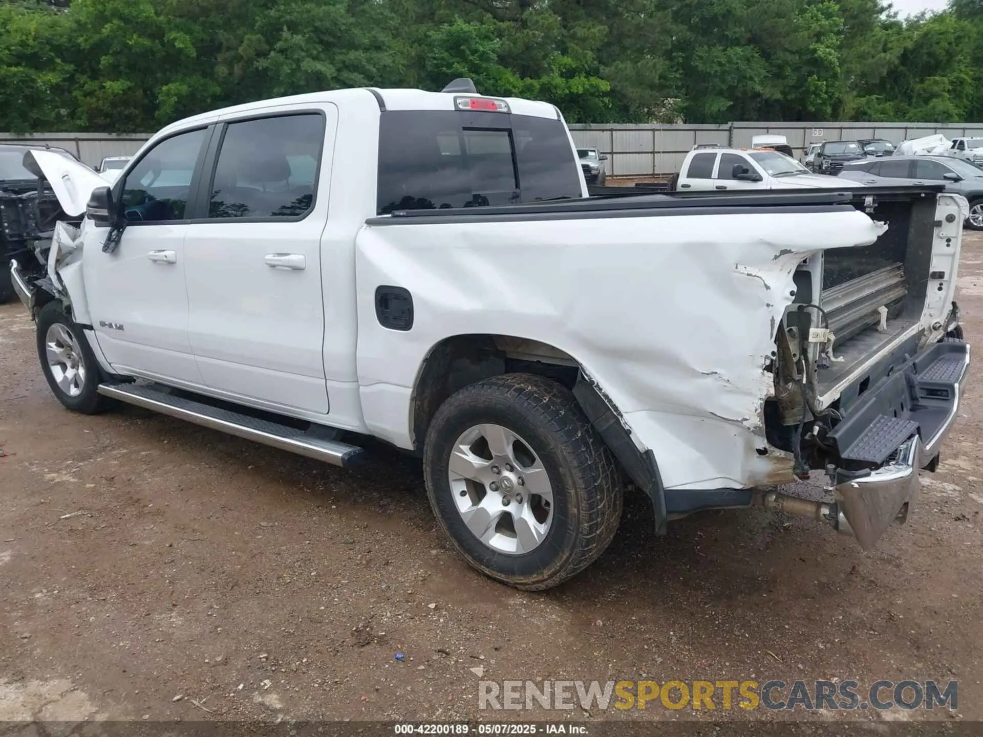 3 Photograph of a damaged car 1C6SRFFTXMN744336 RAM 1500 2021