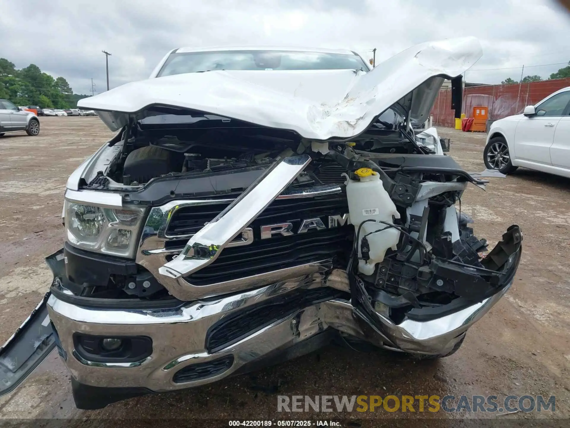 6 Photograph of a damaged car 1C6SRFFTXMN744336 RAM 1500 2021