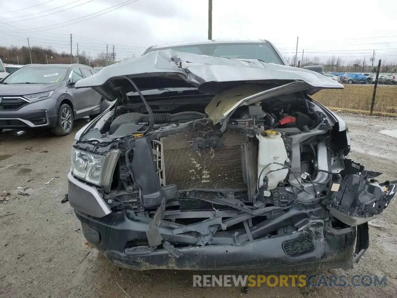 5 Photograph of a damaged car 1C6SRFGT8MN645481 RAM 1500 2021