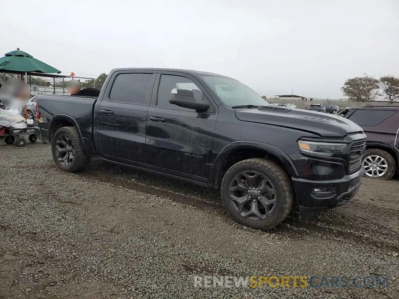 4 Photograph of a damaged car 1C6SRFHM1MN748538 RAM 1500 2021