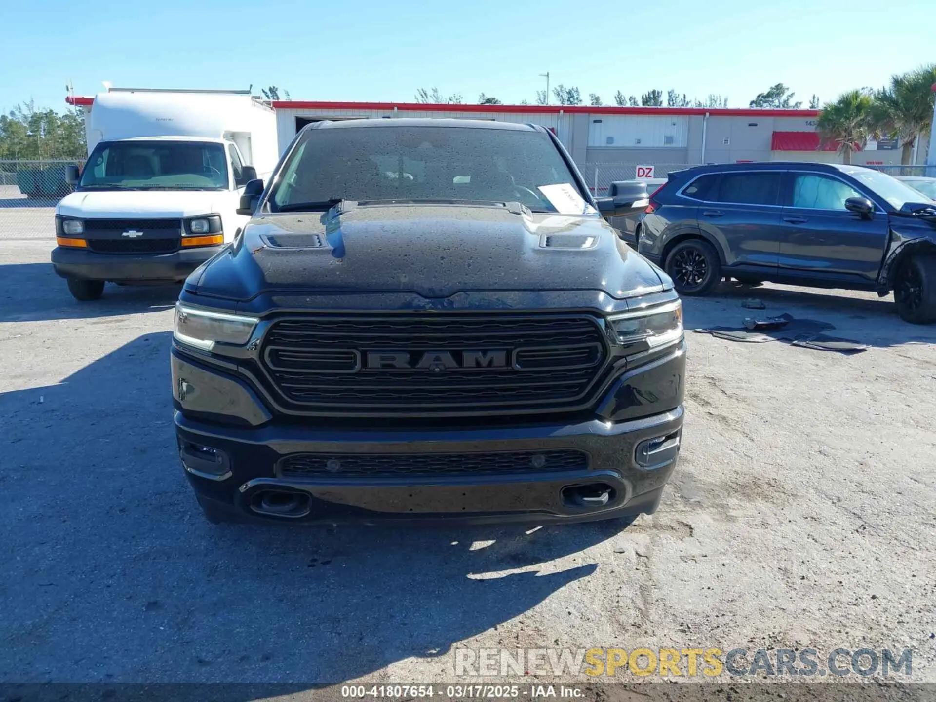 12 Photograph of a damaged car 1C6SRFHMXMN644565 RAM 1500 2021