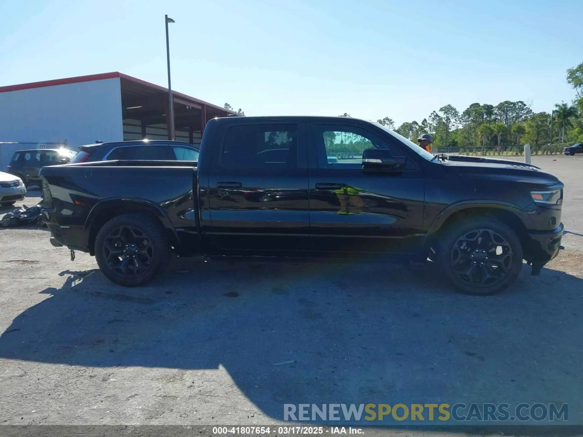 13 Photograph of a damaged car 1C6SRFHMXMN644565 RAM 1500 2021