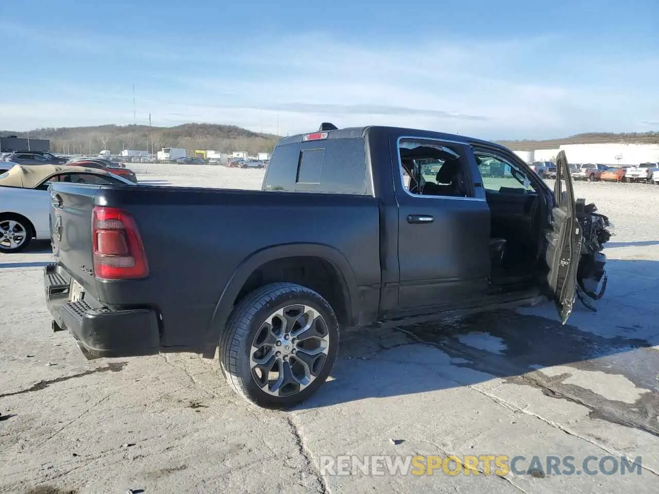 3 Photograph of a damaged car 1C6SRFHMXMN790741 RAM 1500 2021