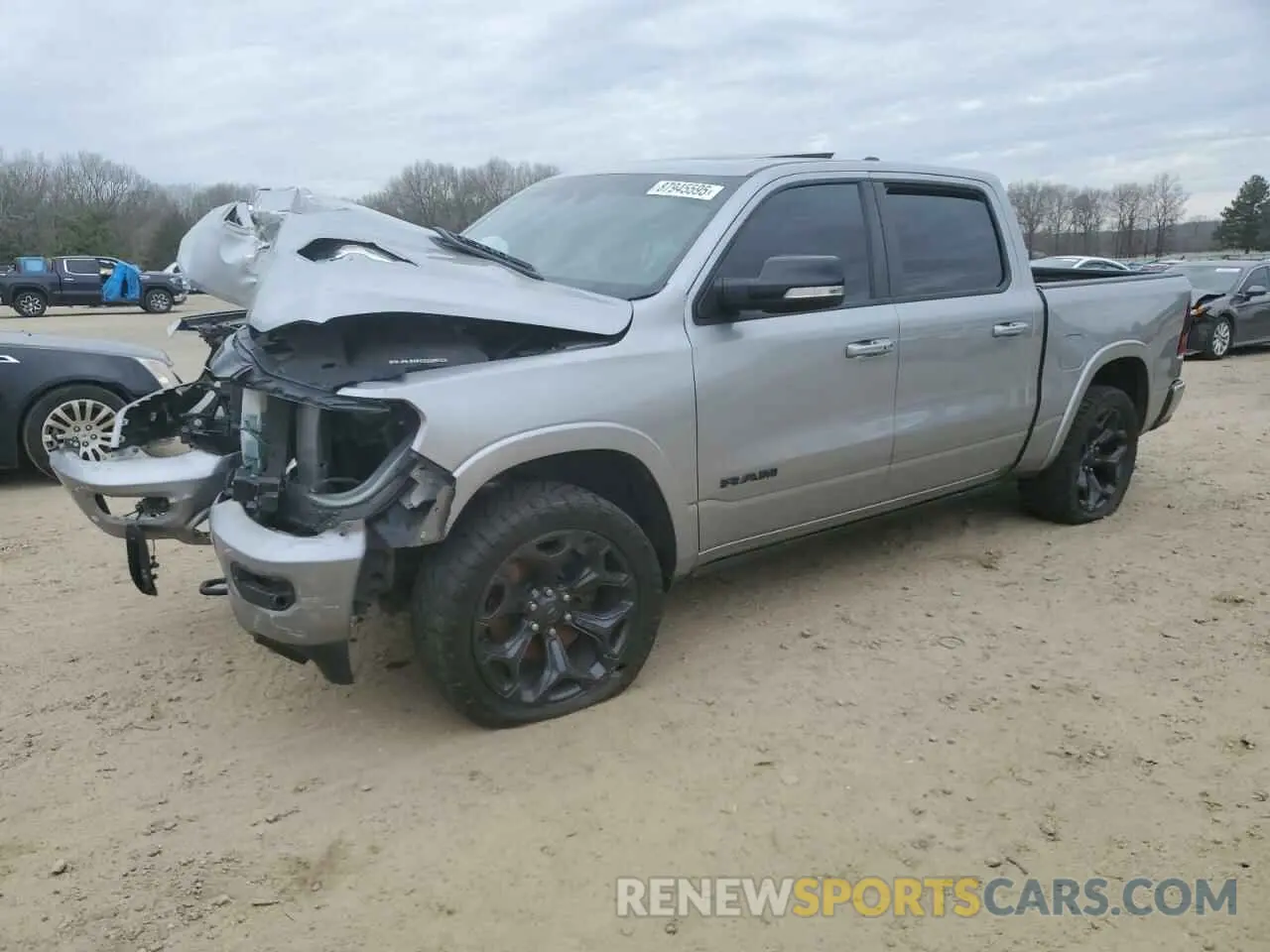 1 Photograph of a damaged car 1C6SRFHT0MN550332 RAM 1500 2021