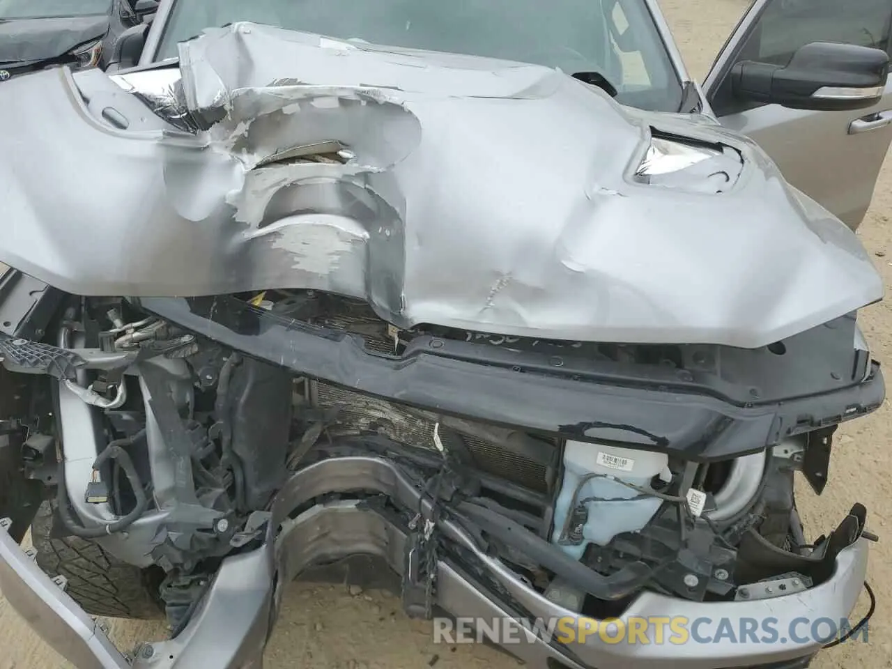 11 Photograph of a damaged car 1C6SRFHT0MN550332 RAM 1500 2021