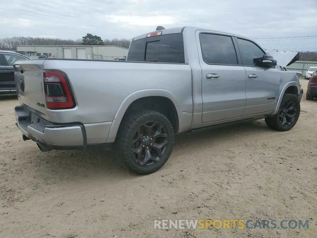 3 Photograph of a damaged car 1C6SRFHT0MN550332 RAM 1500 2021