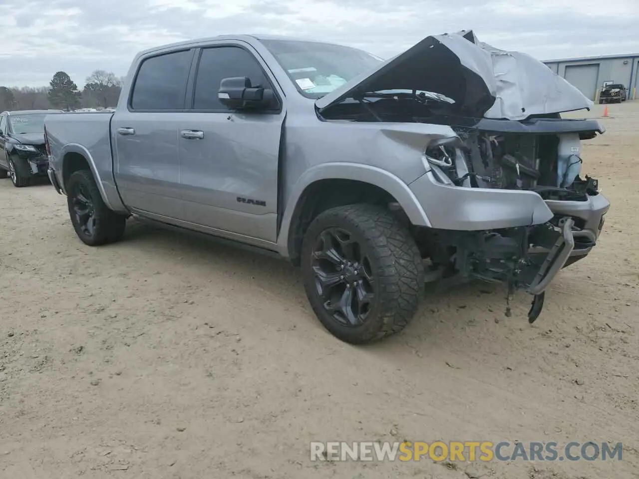 4 Photograph of a damaged car 1C6SRFHT0MN550332 RAM 1500 2021