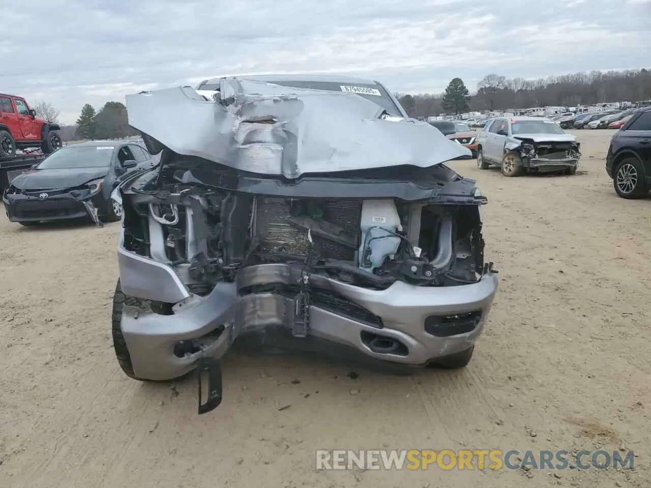 5 Photograph of a damaged car 1C6SRFHT0MN550332 RAM 1500 2021