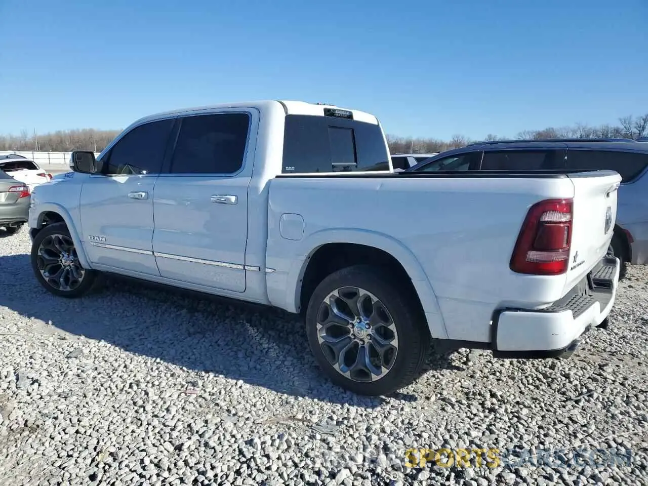 2 Photograph of a damaged car 1C6SRFHT1MN831295 RAM 1500 2021