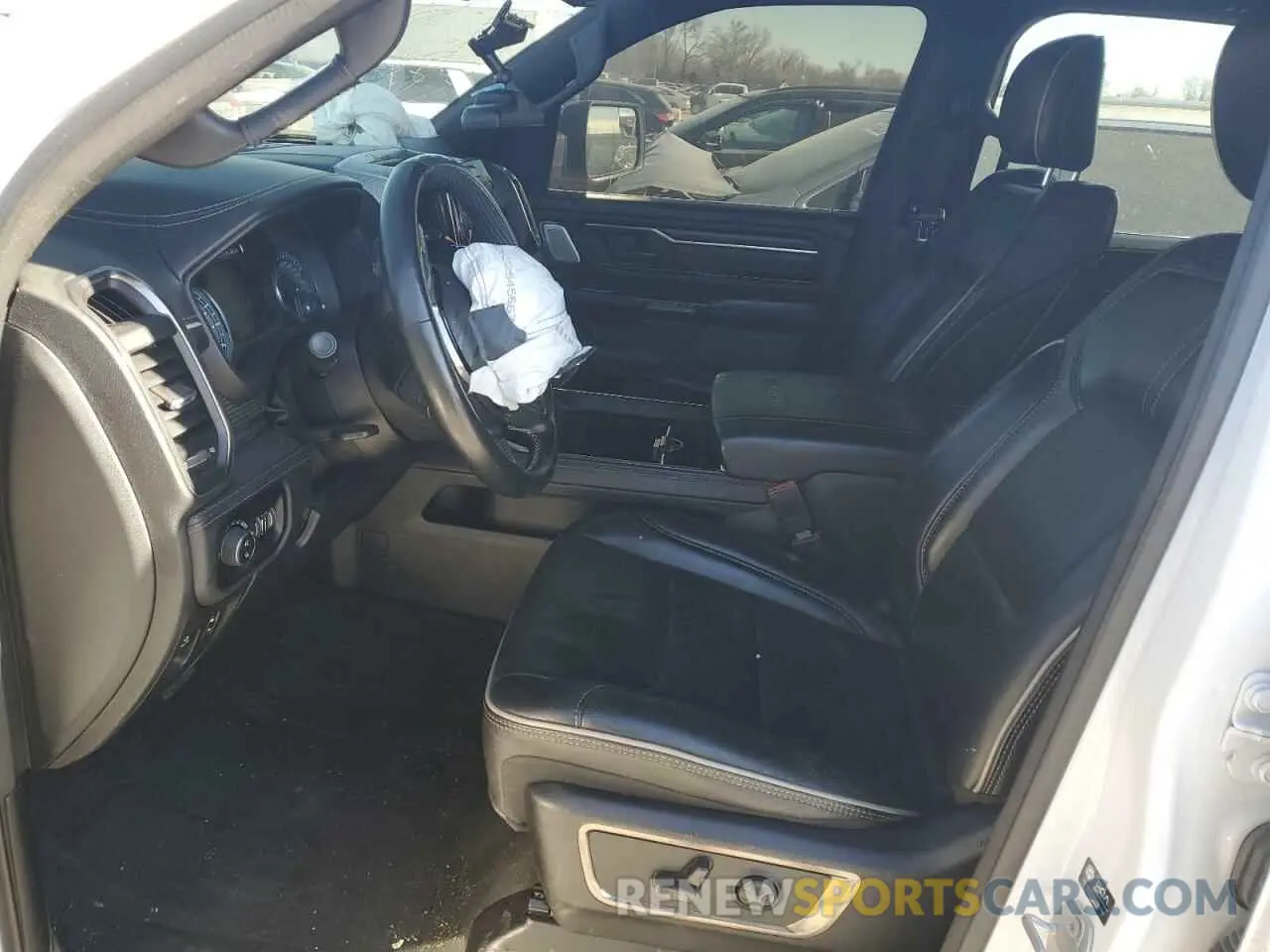 7 Photograph of a damaged car 1C6SRFHT1MN831295 RAM 1500 2021