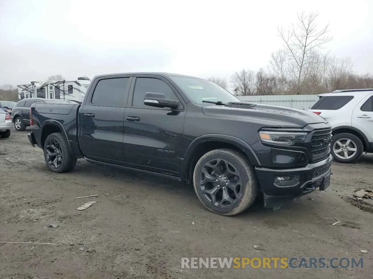 4 Photograph of a damaged car 1C6SRFHT4MN624920 RAM 1500 2021
