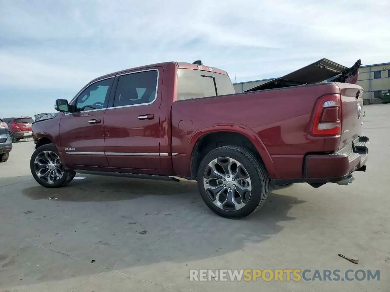 2 Photograph of a damaged car 1C6SRFHT5MN600819 RAM 1500 2021