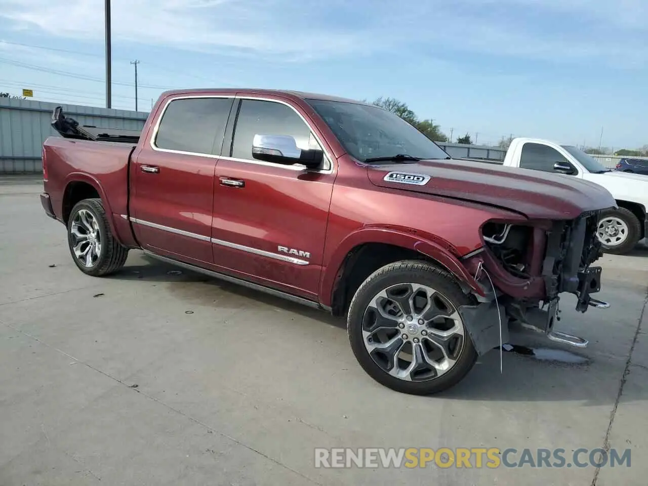 4 Photograph of a damaged car 1C6SRFHT5MN600819 RAM 1500 2021