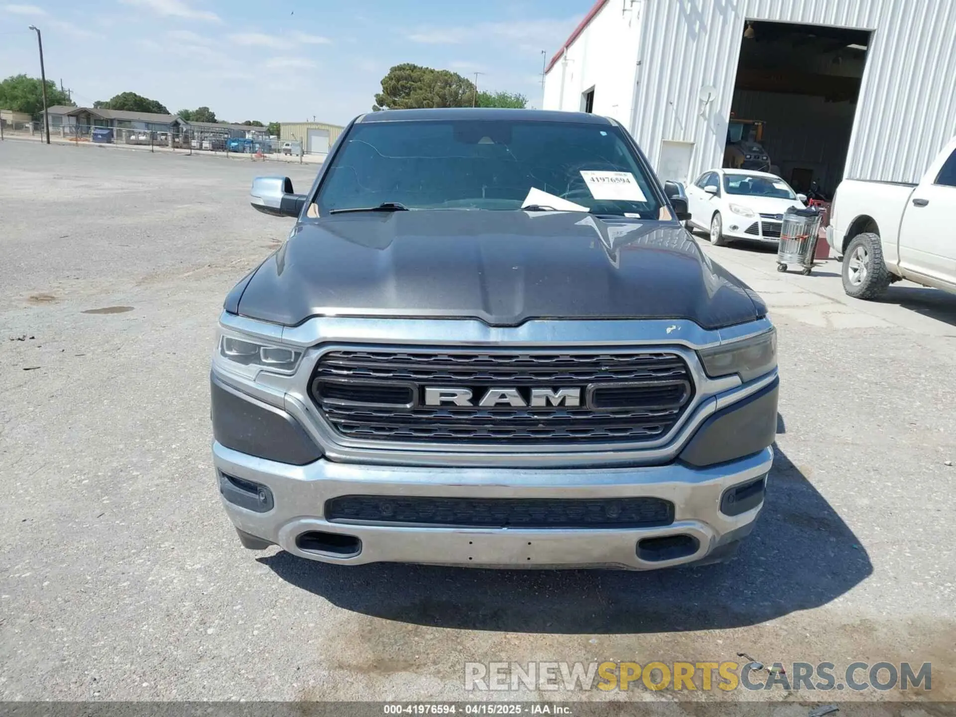 11 Photograph of a damaged car 1C6SRFHT8MN640179 RAM 1500 2021
