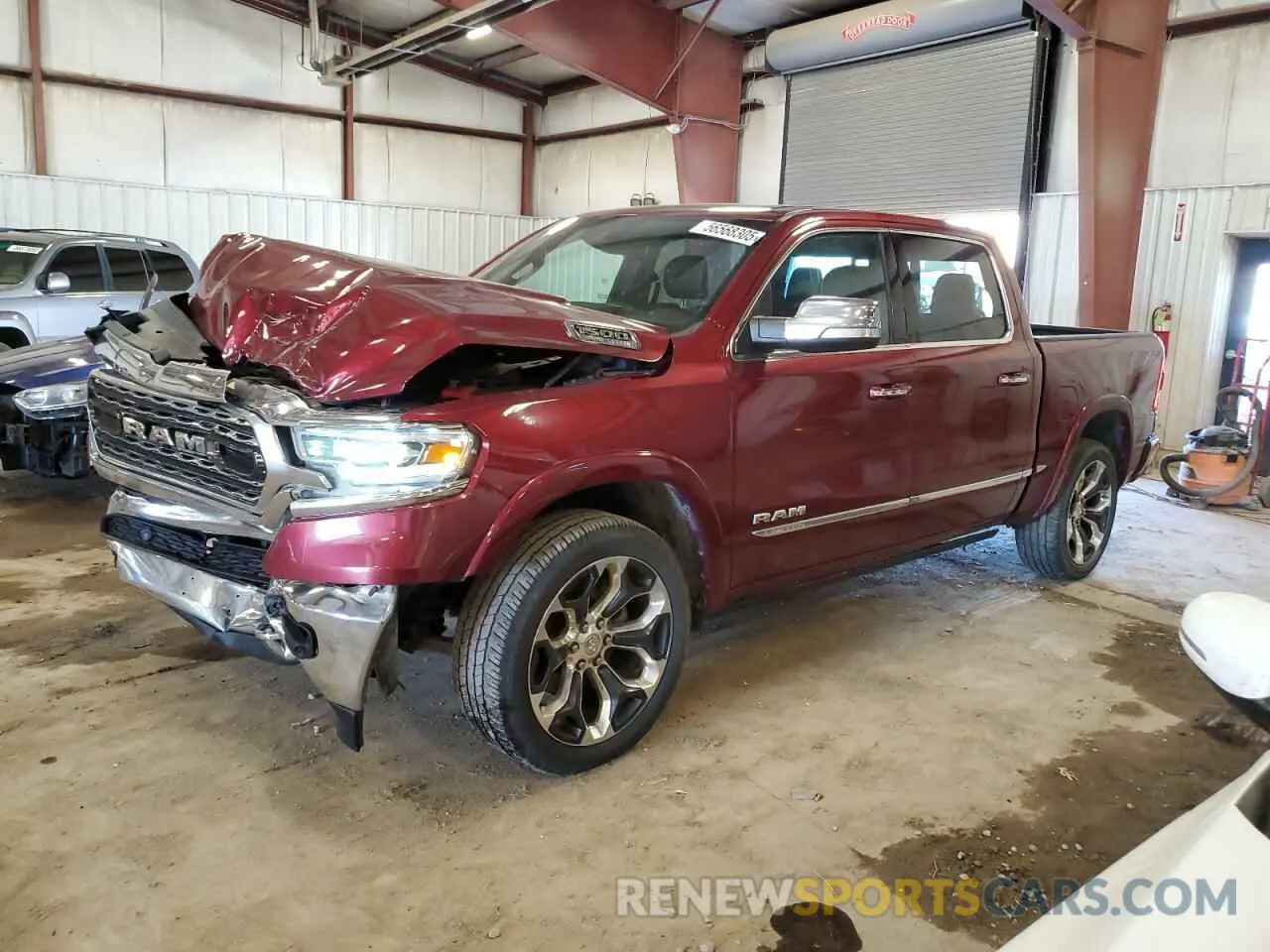 1 Photograph of a damaged car 1C6SRFHT9MN501081 RAM 1500 2021
