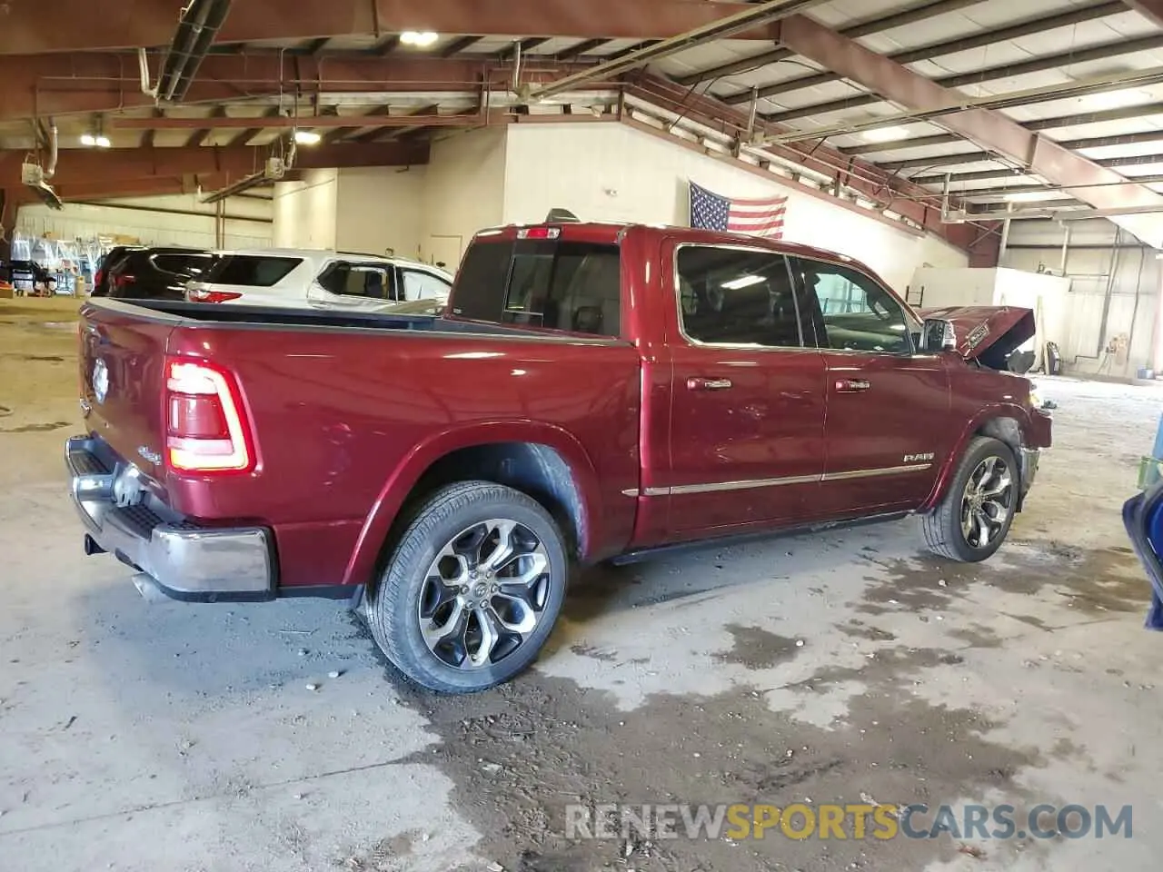 3 Photograph of a damaged car 1C6SRFHT9MN501081 RAM 1500 2021