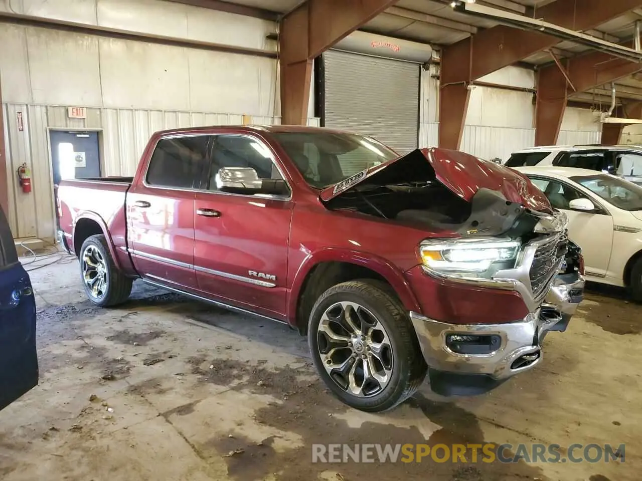 4 Photograph of a damaged car 1C6SRFHT9MN501081 RAM 1500 2021
