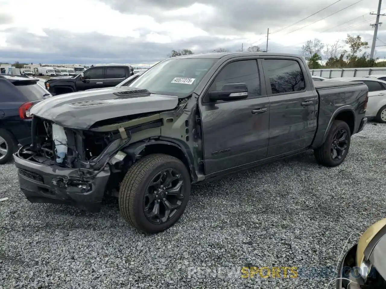 1 Photograph of a damaged car 1C6SRFHT9MN552032 RAM 1500 2021