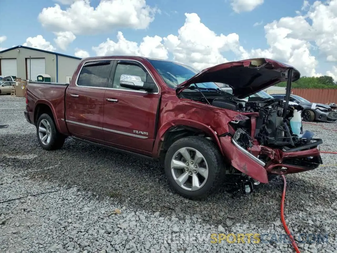 4 Photograph of a damaged car 1C6SRFHT9MN633502 RAM 1500 2021