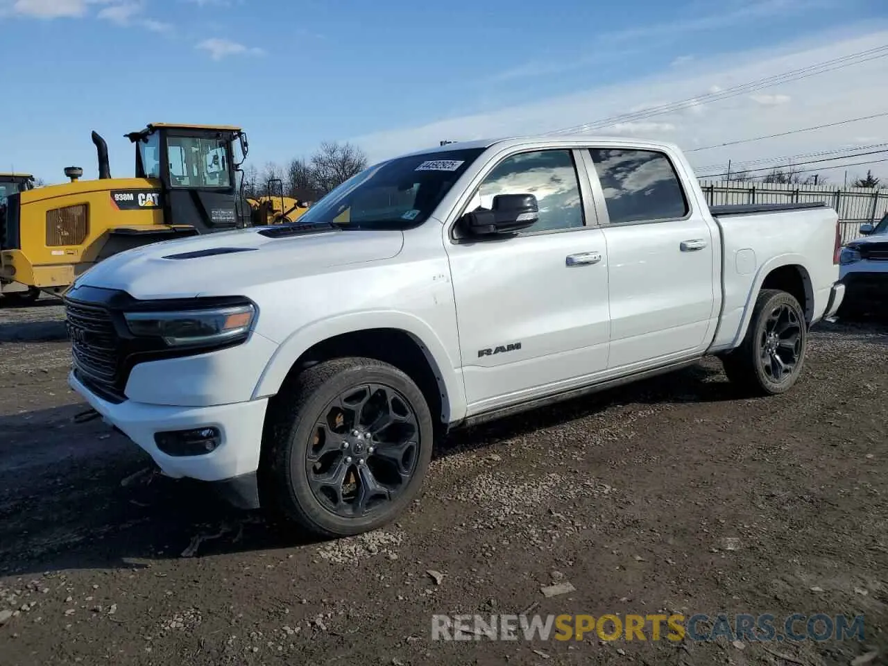 1 Photograph of a damaged car 1C6SRFHT9MN812994 RAM 1500 2021