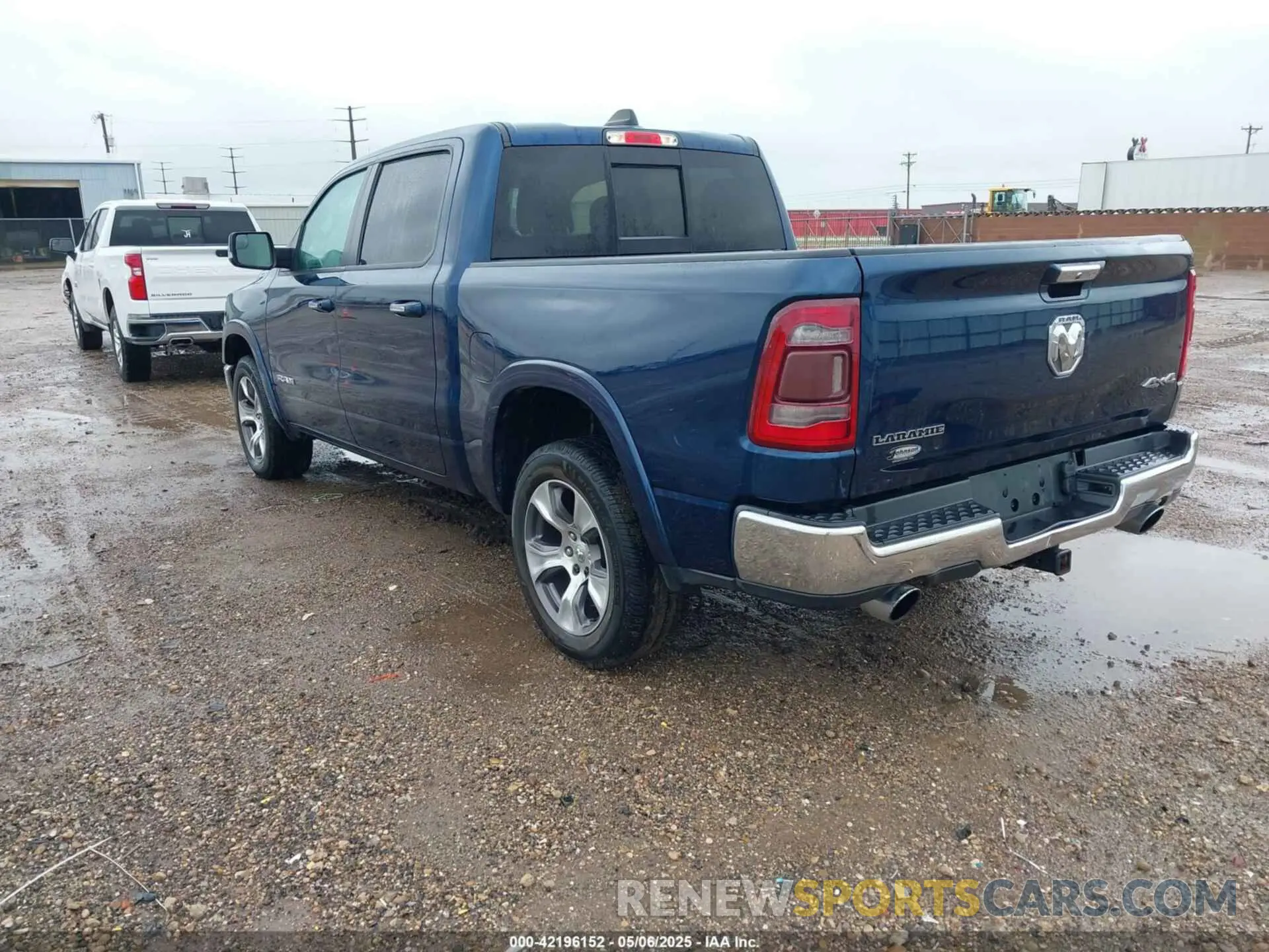 3 Photograph of a damaged car 1C6SRFJM0MN682896 RAM 1500 2021