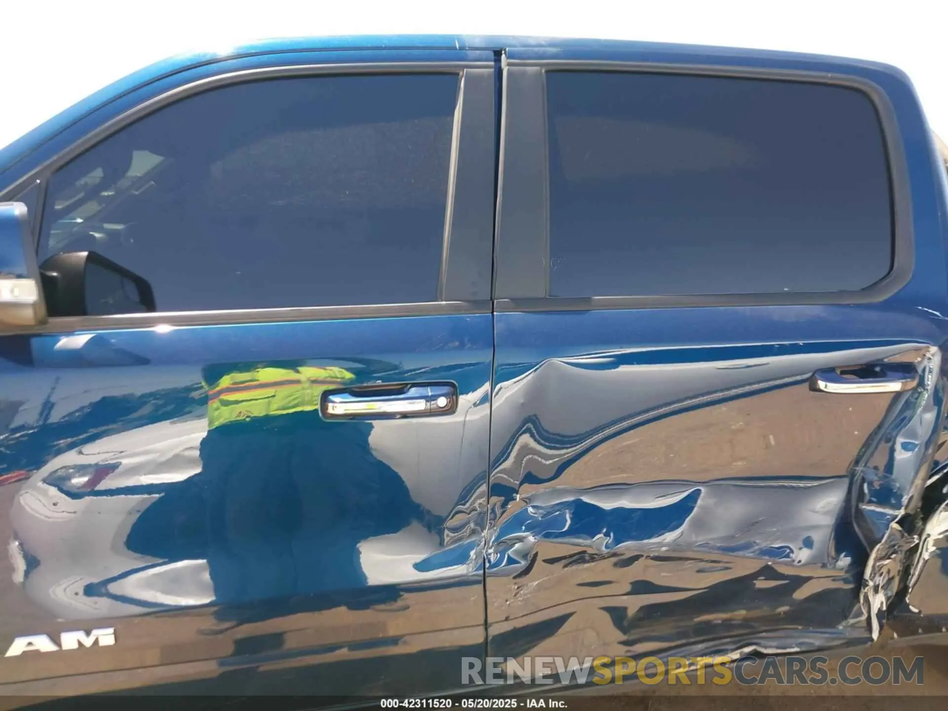 14 Photograph of a damaged car 1C6SRFJT0MN507930 RAM 1500 2021